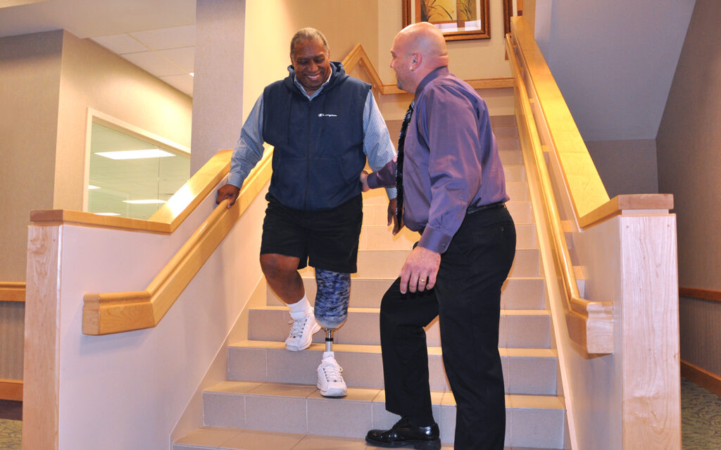 Physical therapist helping patient at Whittier Rehabilitation PT clinic in Massachusetts